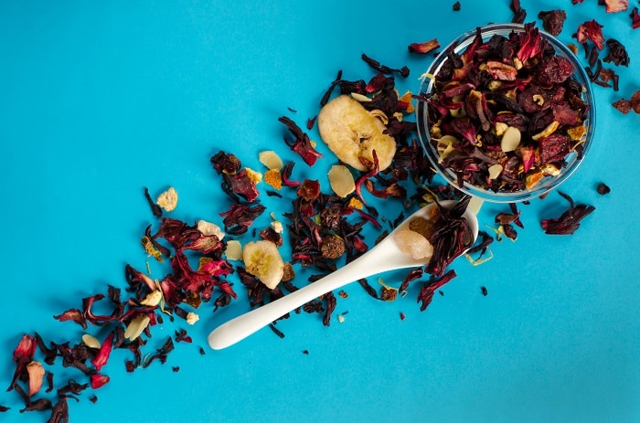 Hibiscus Tea - Putting dried flowers